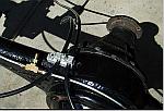 Cable clamp on rear axle