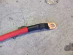 Crimped and heat shrunk battery cable